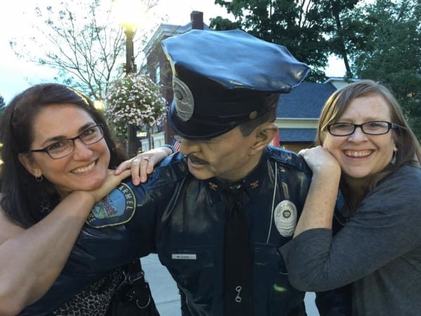 ann and charity with policeman sculpture