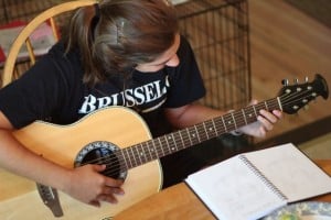 What's Your Family Culture? - Ann Kroeker - girl learns guitar