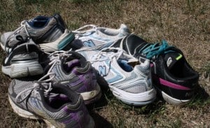 pile of running shoes